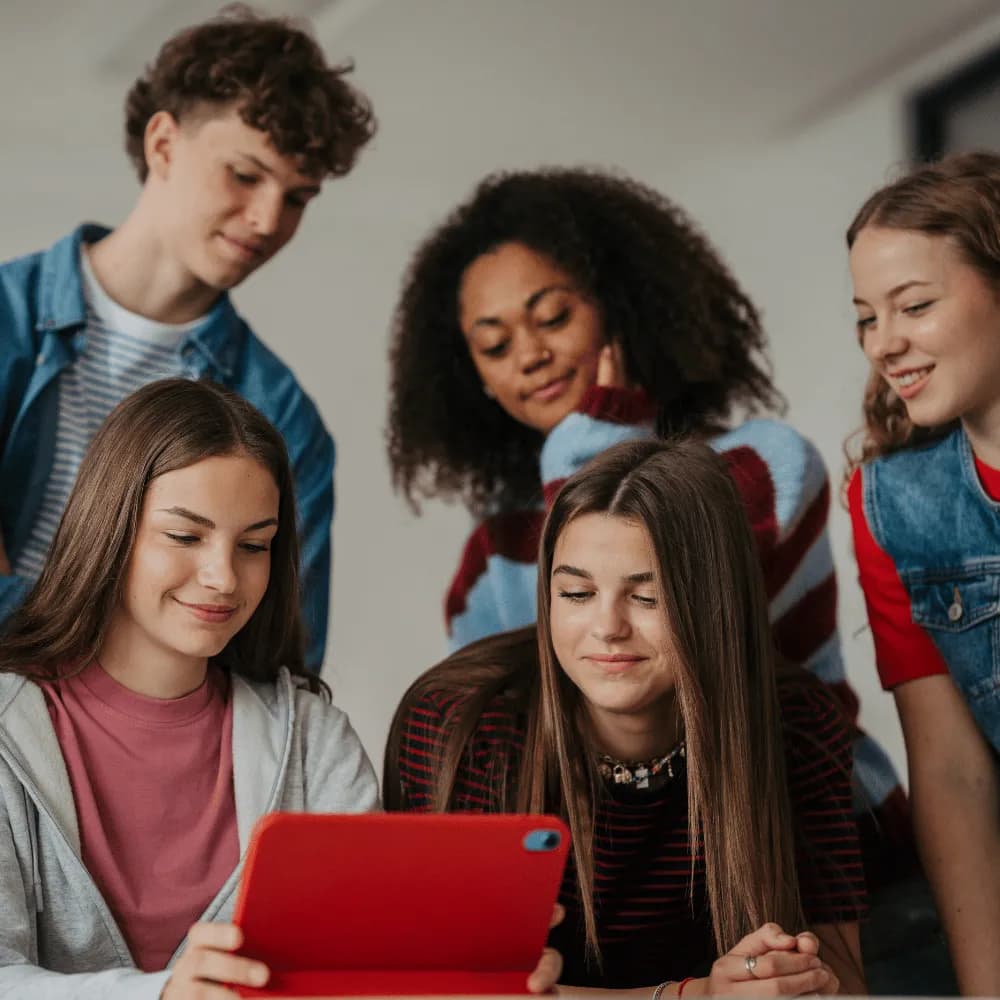 Young people learning AI as part of the Red Hat and Teens in AI partnership across EMEA